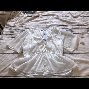 Clip dot tie front flowy top